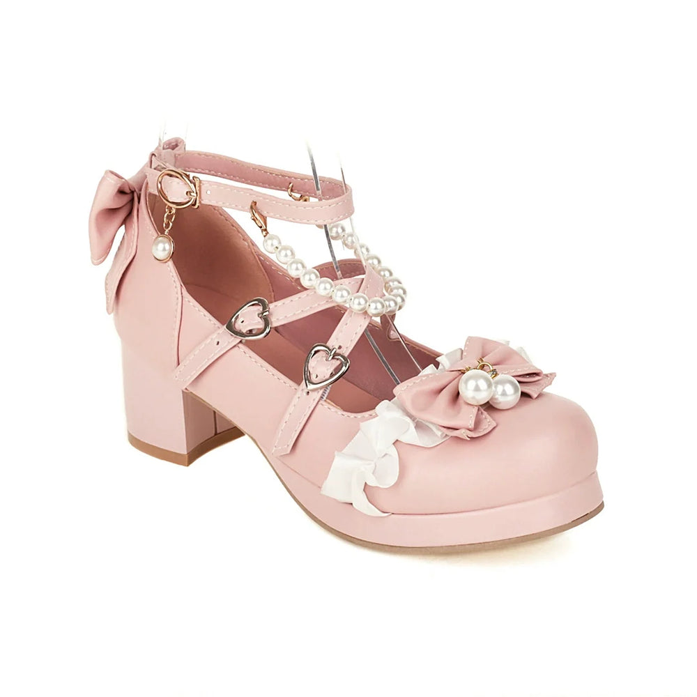 Pink Sweet Lolita shoes with bow fronts, ruffle edging, ankle strap and chunky heel