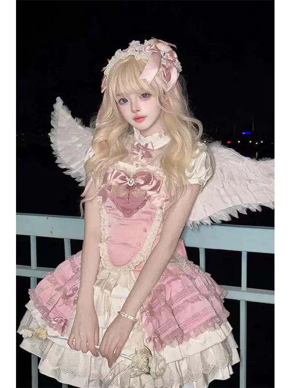 Pink magical-girl Lolita blouse-and-skirt set with a lace-trimmed bodice and ruffled skirt.