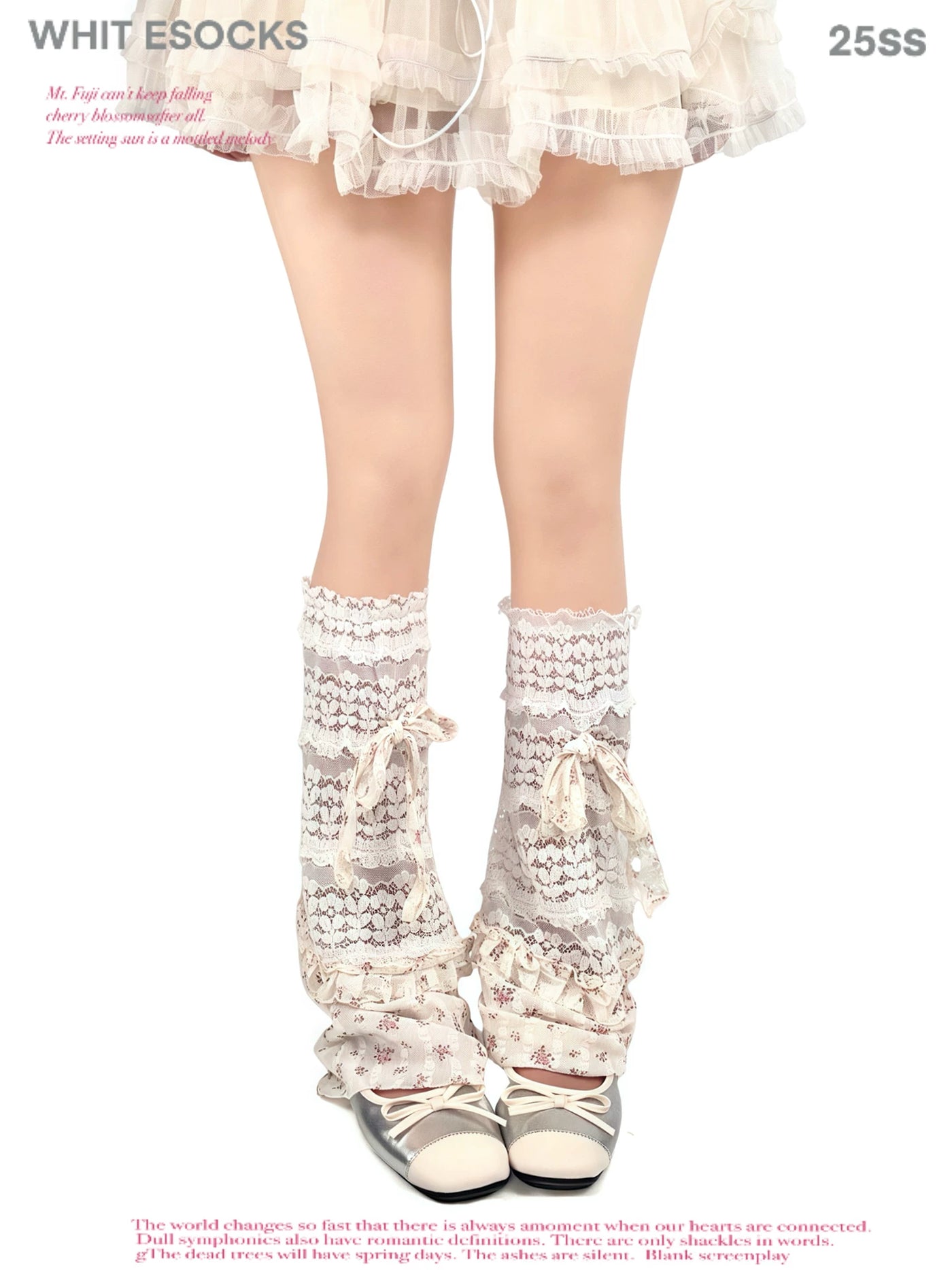 White Lolita lace mid-calf socks with scalloped tiers, side bow ties, and ruffled cuffs