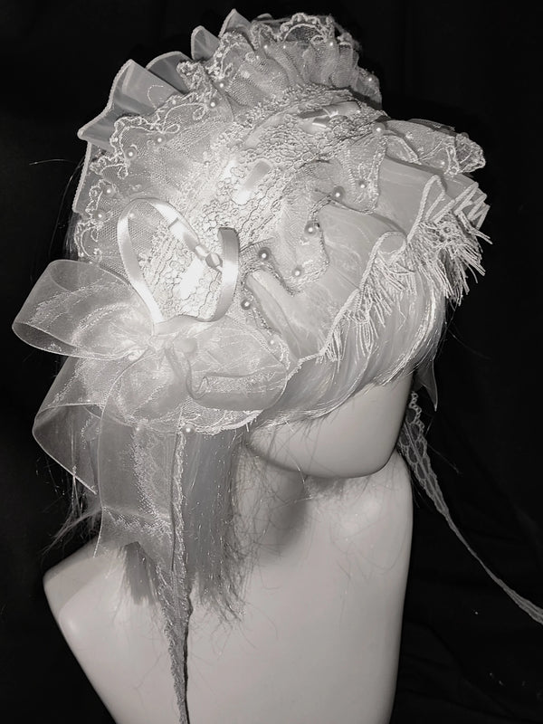 Pure white and pure black eyelash lace hairbands displayed on mannequins.