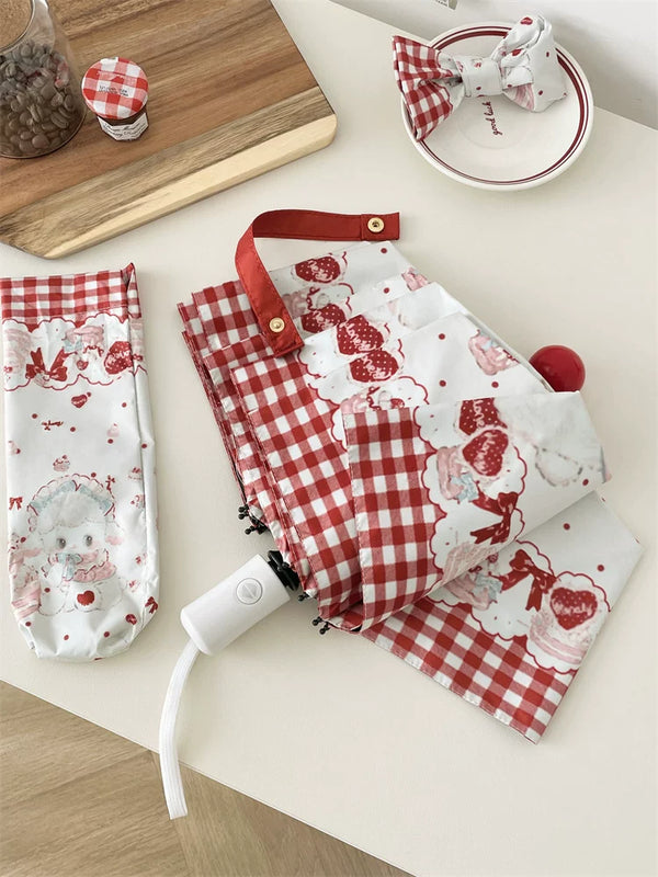 Open Cake Little Sheep parasol with sheep print and red plaid border