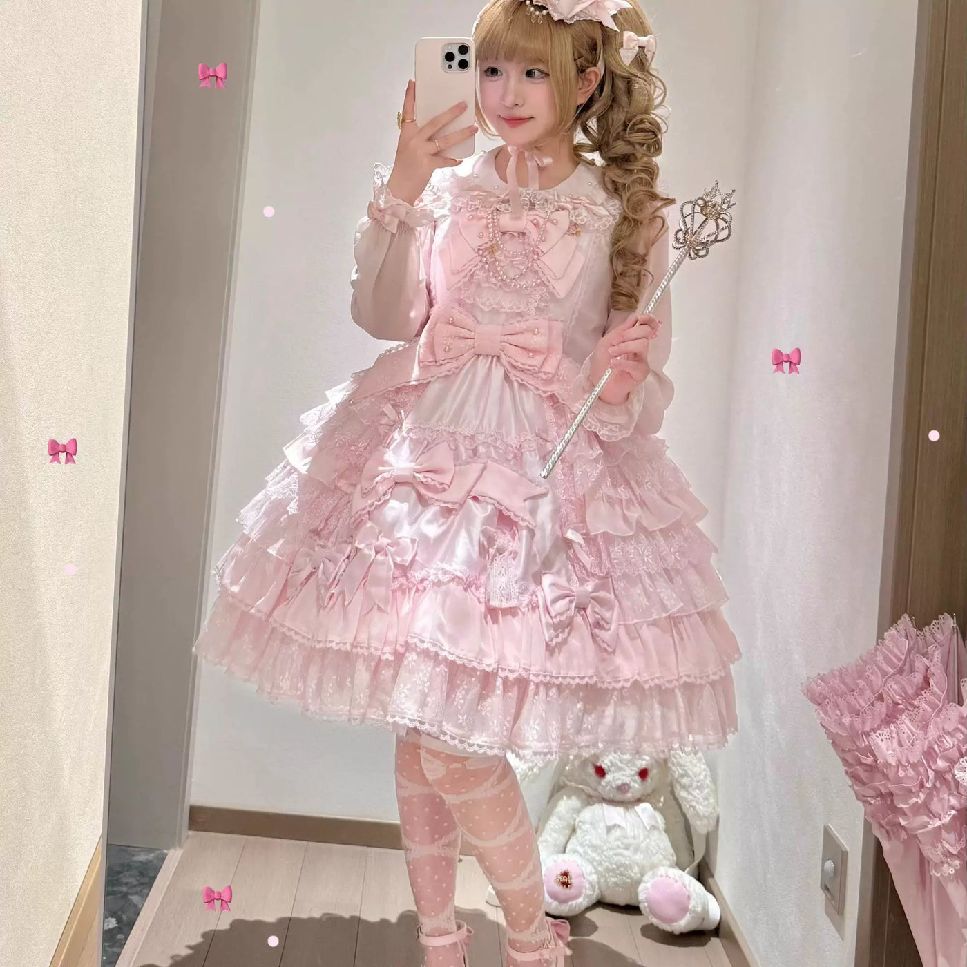 Icy translucent chiffon blouse with lace, pearl, and bow details, shown in pink and white variants.