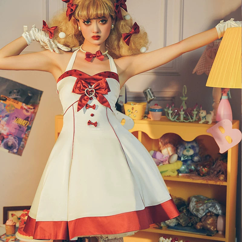 Baozi Pig milky white JSK dress with red trim and bow details.