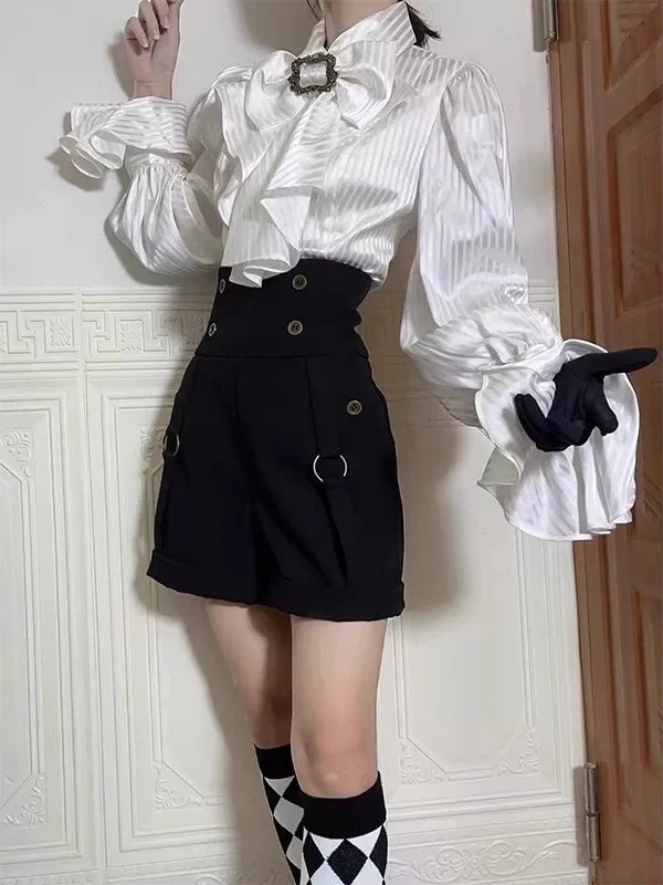 Creamy black-and-white blouse and shorts set with a high-collar blouse and chest bow