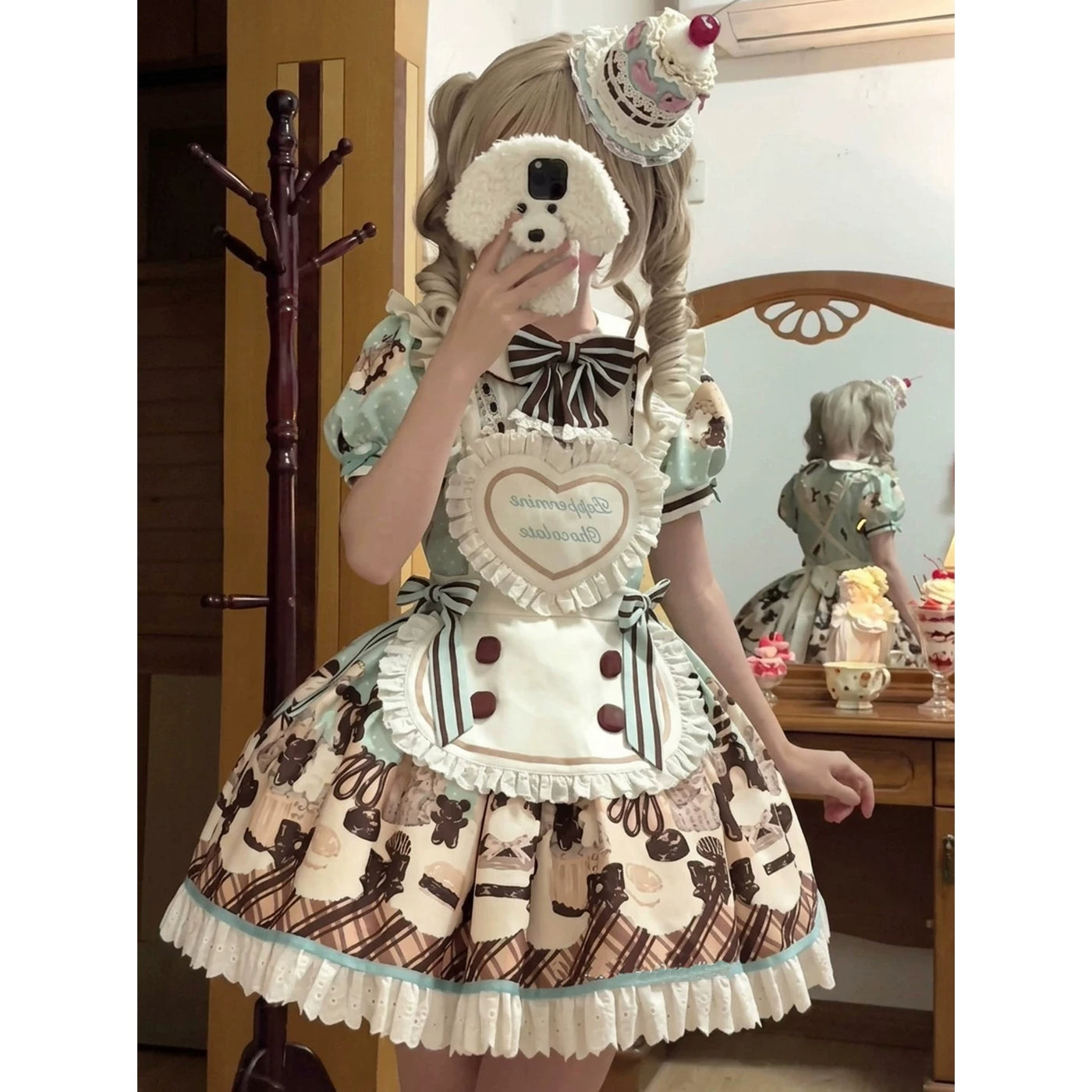 Tiered Sweet Lolita dress with ruffled trim and white lace hem