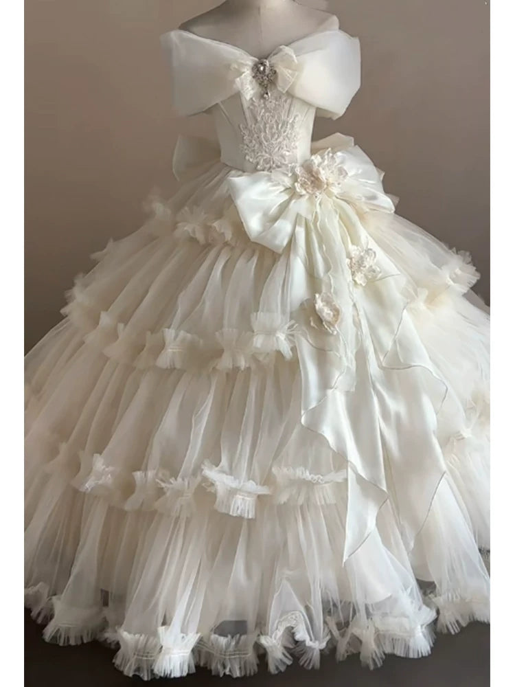 Flora Muse champagne Lolita bridal ball gown with off-shoulder neckline, tiered skirt, and included skirt support