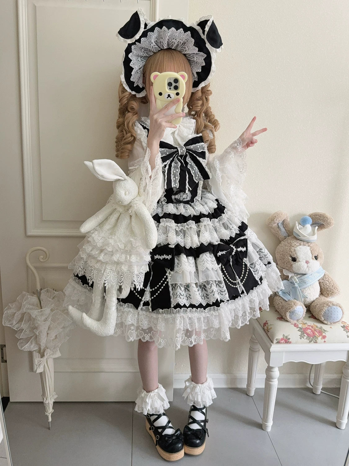 Lady Han Cross Heart Knot Sweet JSK dress by Lolita Fetch featuring a charming pink and white floral design with bow accents.
