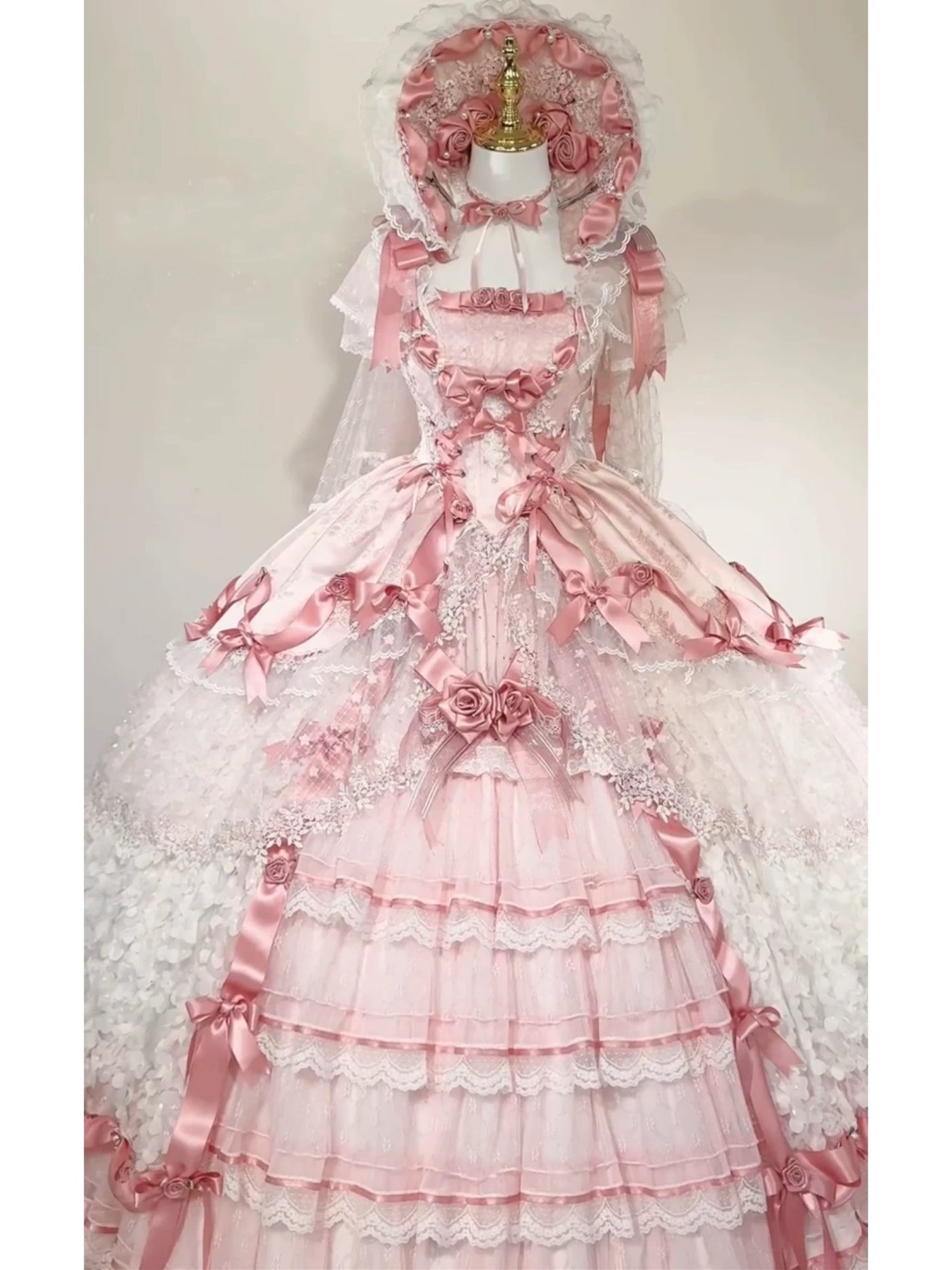 Blush pink Sweet Lolita formal gown with matching petticoat underskirt on mannequin