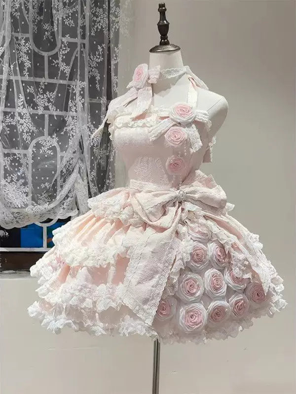 Pink rose dress displayed on a mannequin with lace trim and a layered skirt.