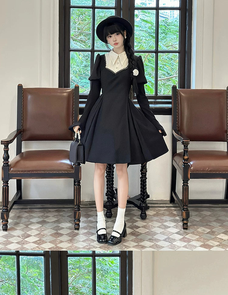 Black Gothic OP dress with bib collar and puffed shoulders.