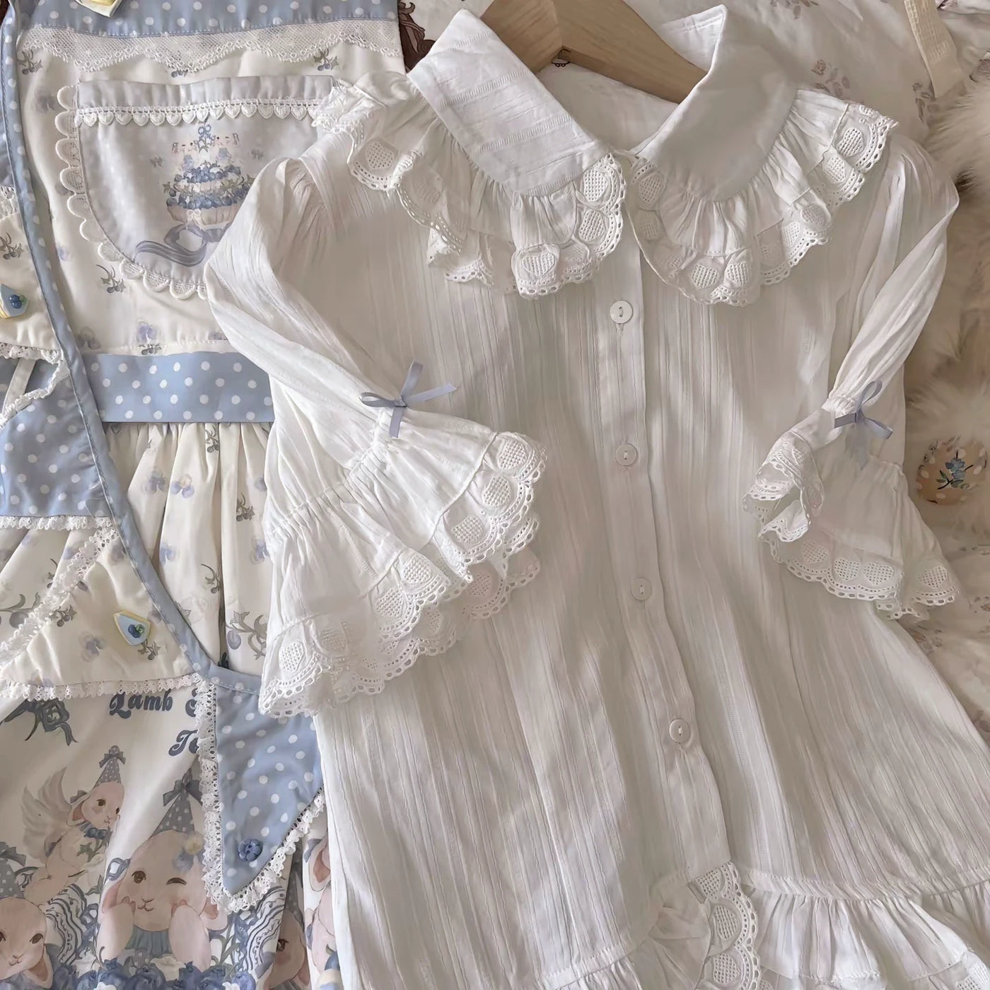 Cream and blue printed JSK with a full skirt and blue polka-dot straps