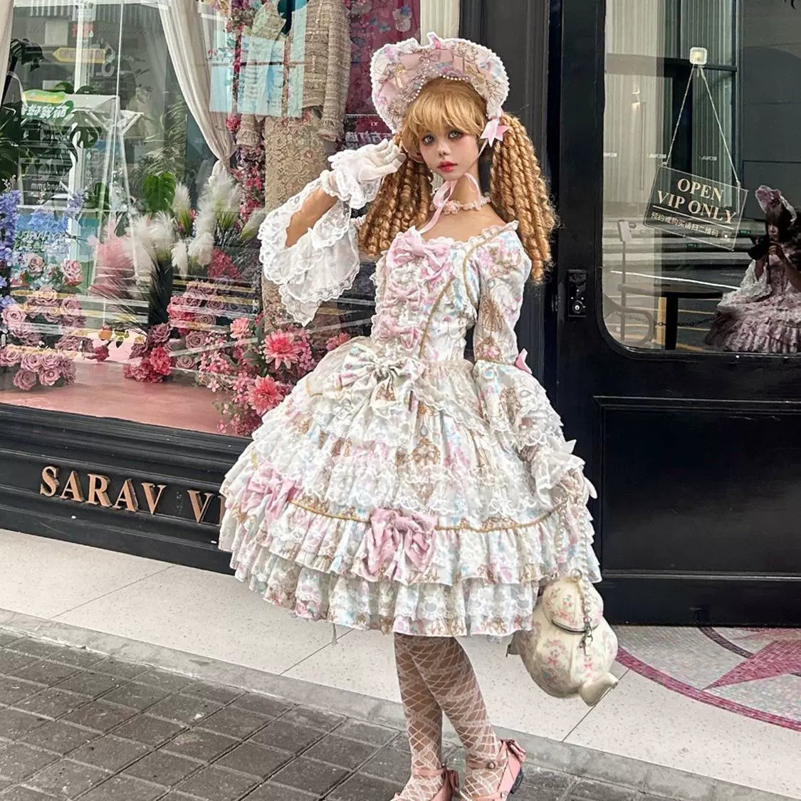Lady Han Candy Chapter Sweet Lolita OP dress with pastel colors and intricate lace details, featuring a bow and floral accents.