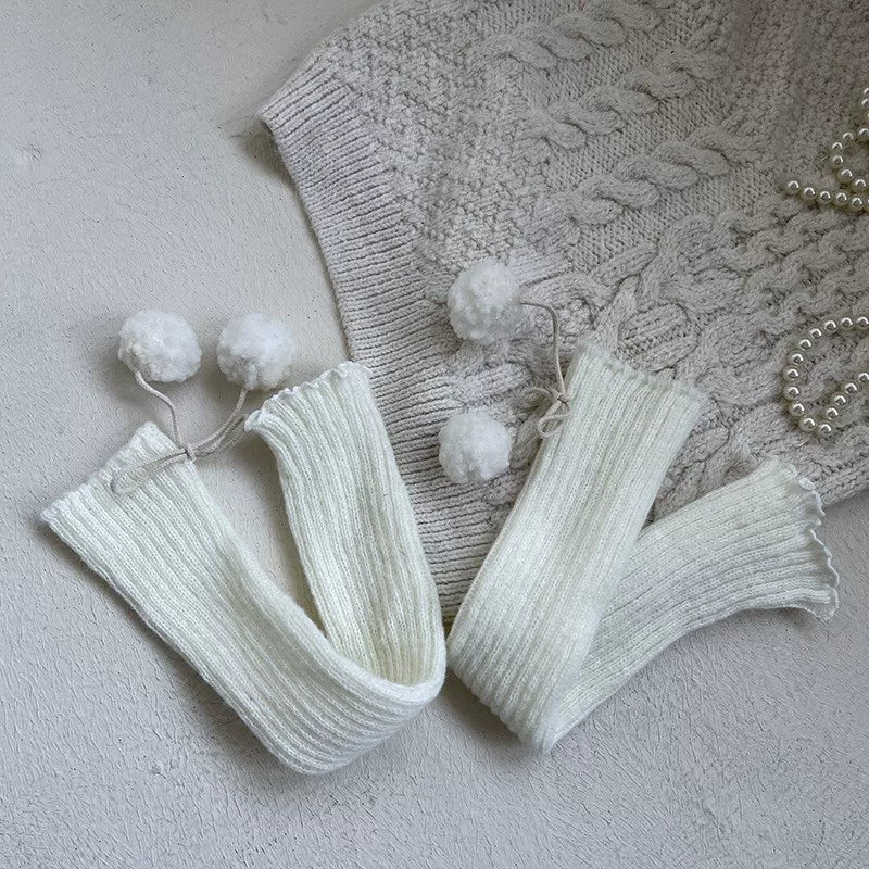 White curly sock covers with attached rabbit figures and white platform shoes