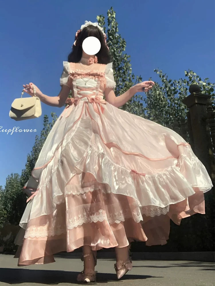 Blush pink sweet lolita ballgown dress with lace-trimmed tiered skirt, full-length view