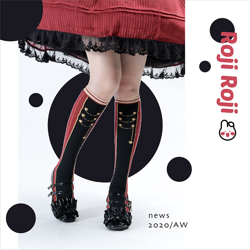 Black red Nutcracker Lolita knee-high socks with red vertical stripes and gold braided accents