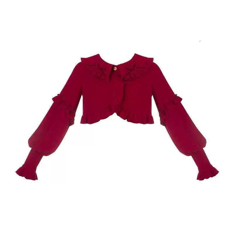 Wine-red and brown short ruffle-collar cardigans styled with layered Lolita skirts outdoors.