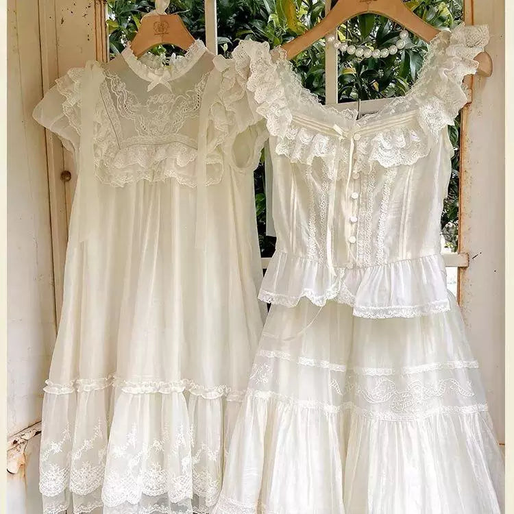 Apricot sweet lolita blouse with lace trim and ruffled cap sleeves, front view