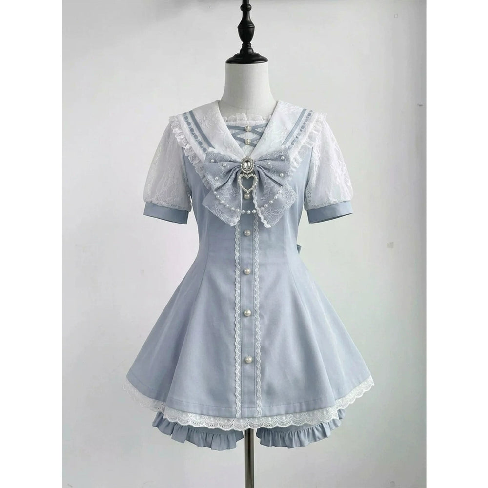 Pale blue sailor-collar dress and shorts set shown front and back on a mannequin