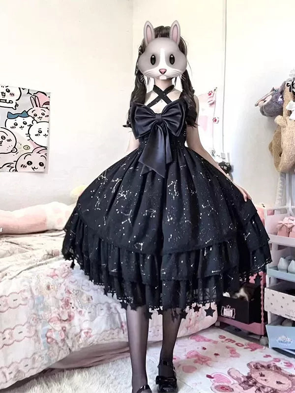 Black layered OP dress with bow bodice and pale decorative motifs