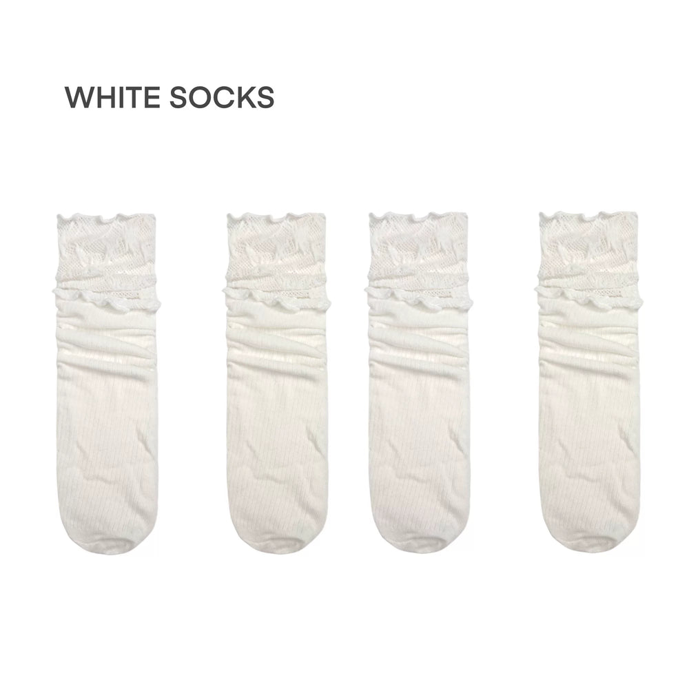 White lace-trimmed mid-calf Lolita socks on plain white background
