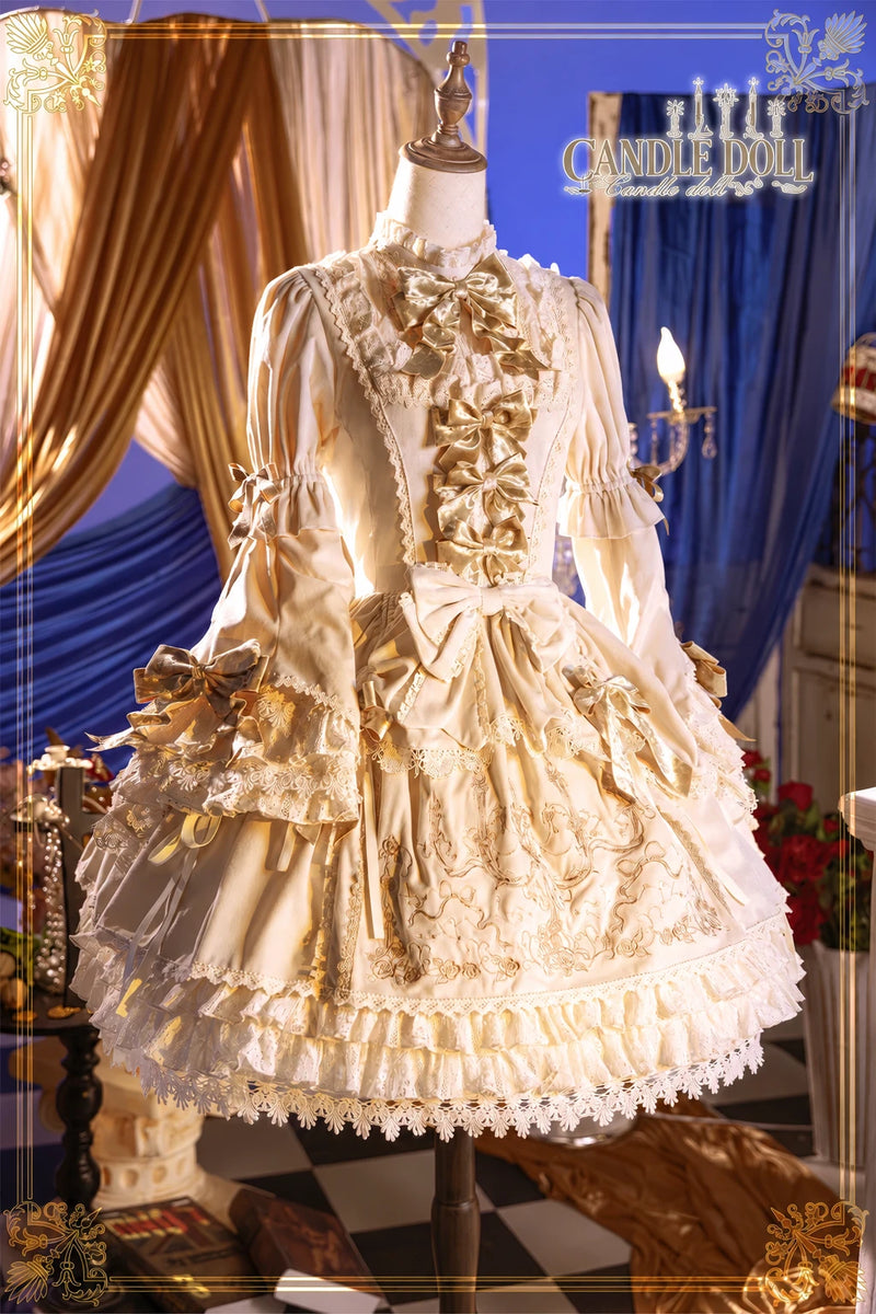 Golden Night Prayer Candle Doll ivory and gold OP dress on a mannequin
