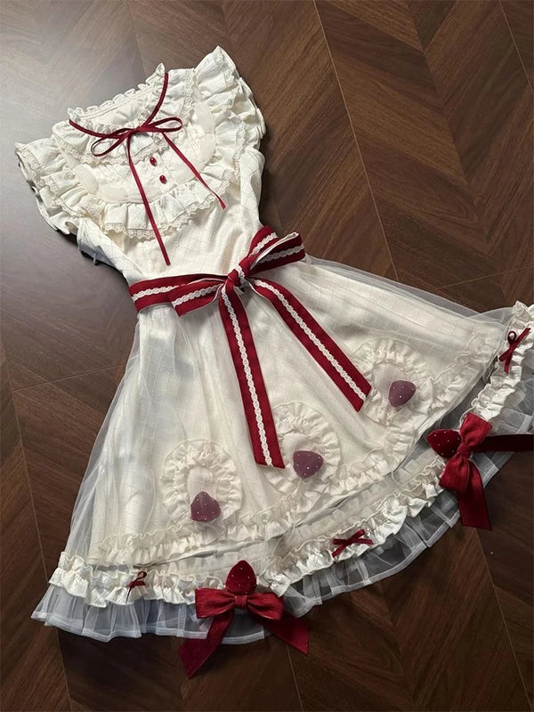 Front view of cream Sweet Lolita OP dress with burgundy bow accents and ruffled tulle skirt