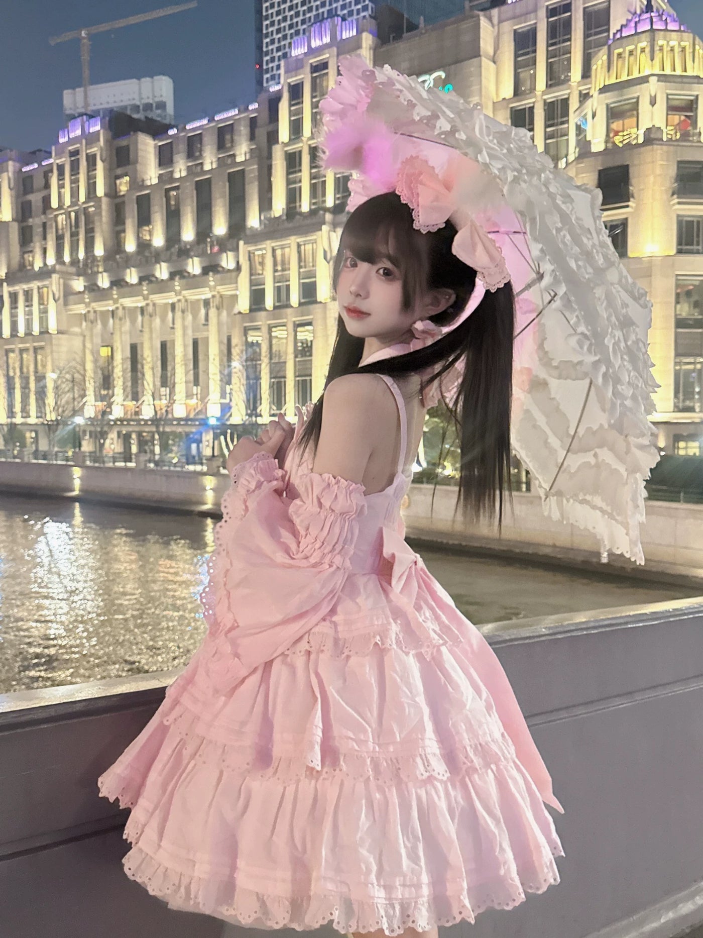 Doll-style Lolita dress with back waist bow and structured tiered silhouette