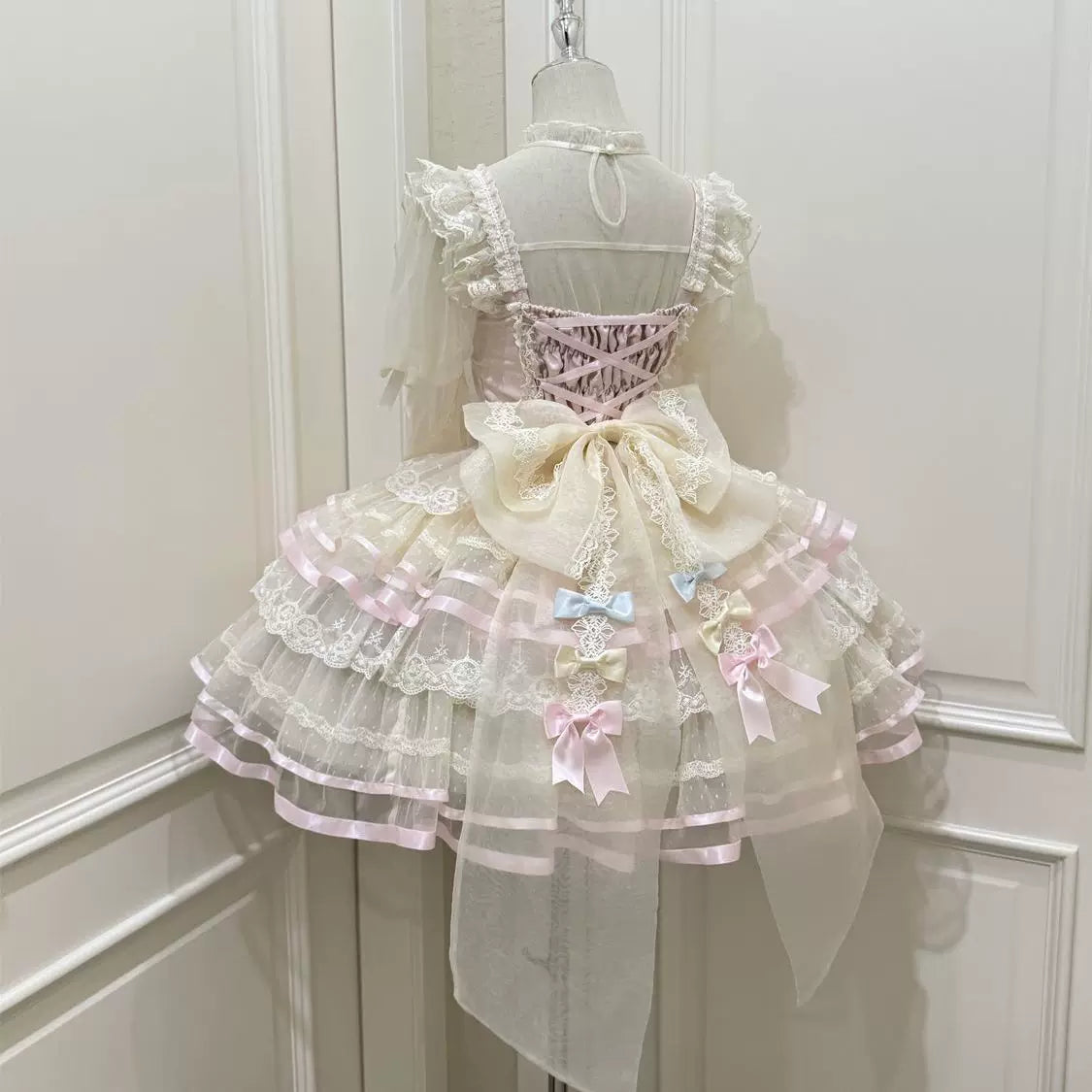 Lady Han Butterfly Ballet JSK Dress by Lolita Fetch featuring a floral ballet print and elegant bow accents on a navy blue fabric