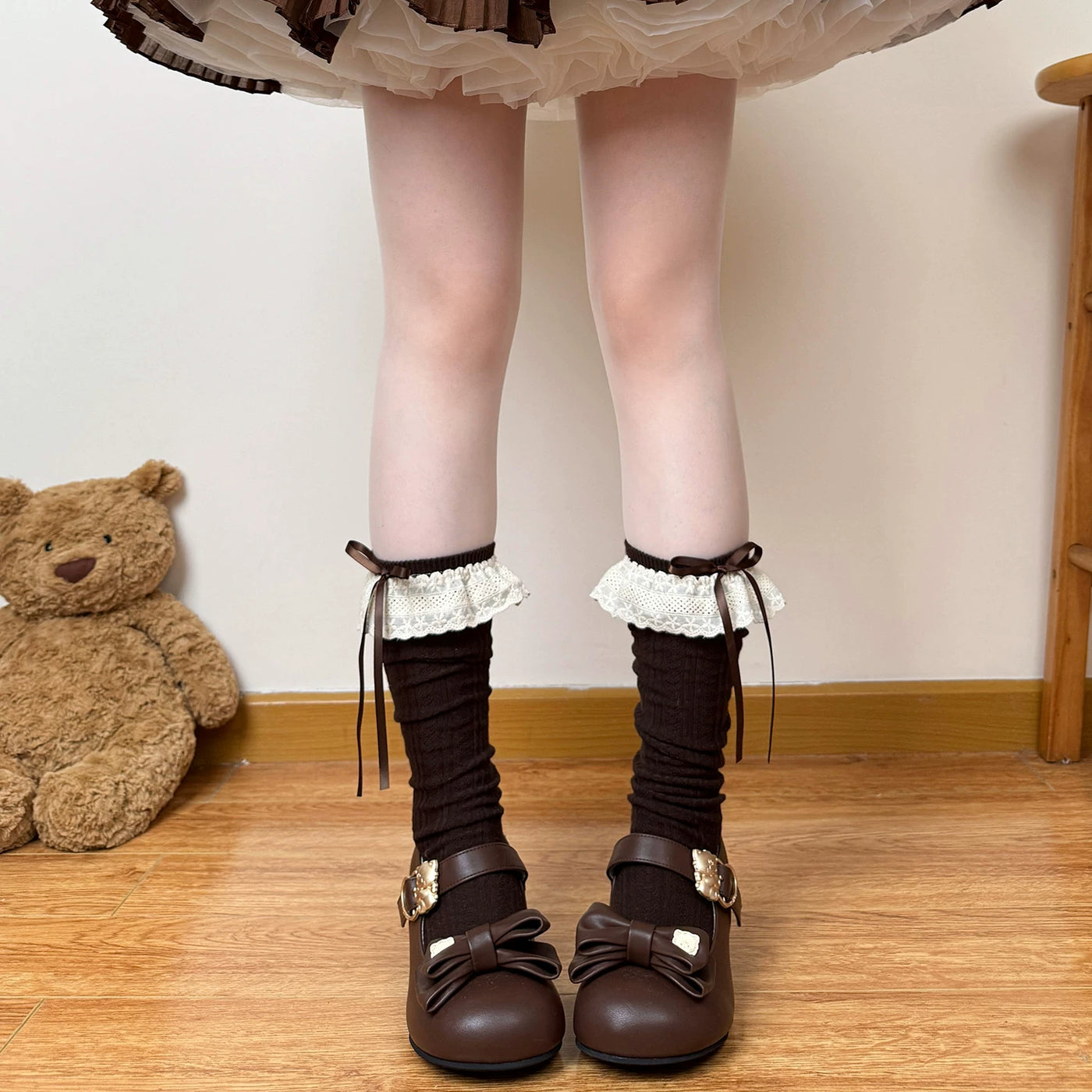 Brown gathered calf socks with lace ruffle cuffs and ribbon ties