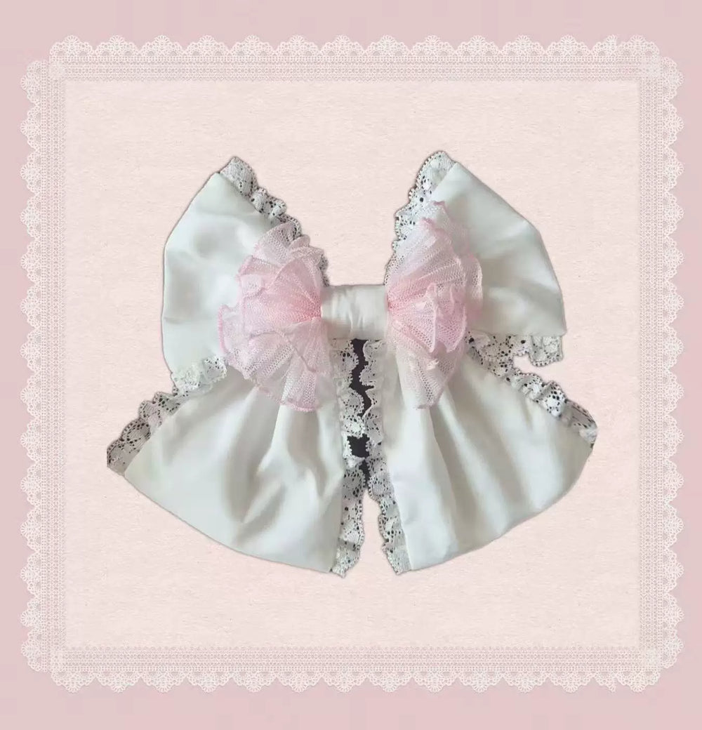 White-and-pink JSK dress with pearl detailing, pink bows and scalloped skirt