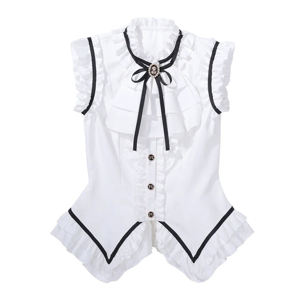 Black-and-white Gothic Lolita top and skirt pieces with ruffles and bow details.