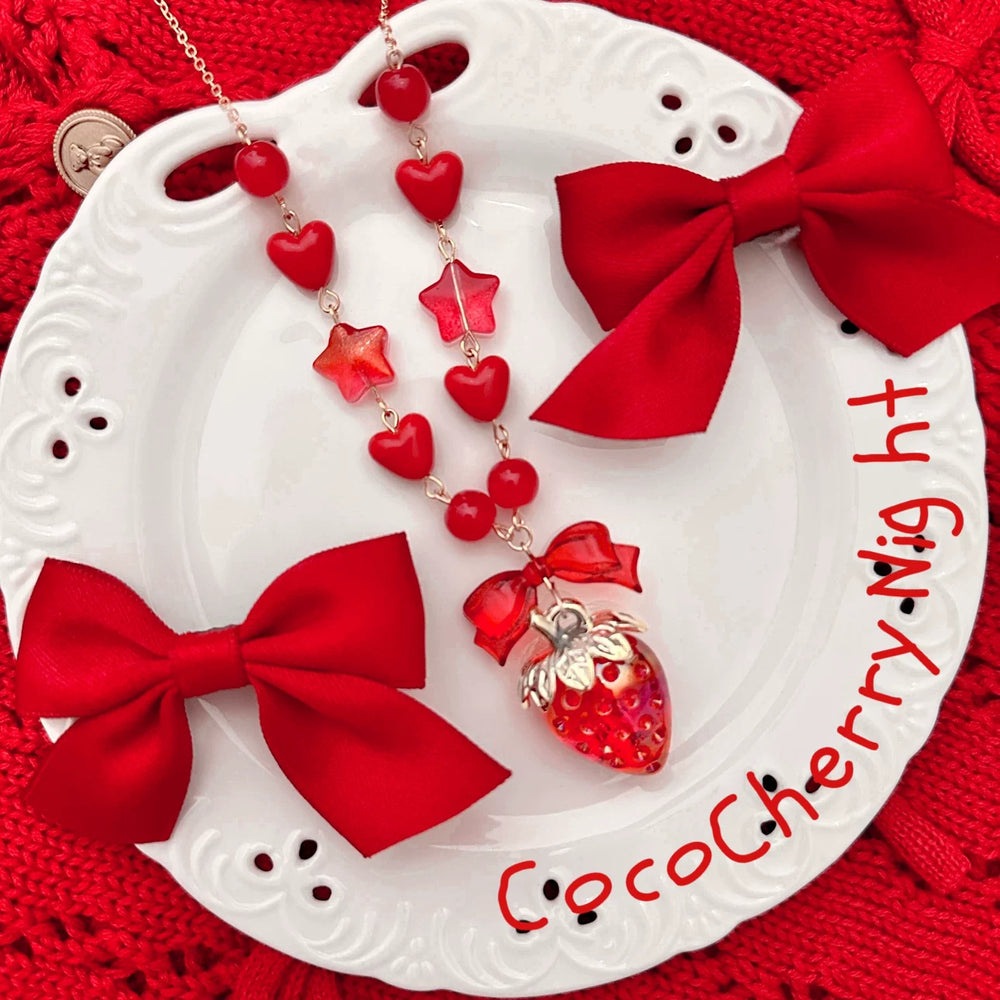 Handmade strawberry necklace with red heart beads, bows and strawberry pendant