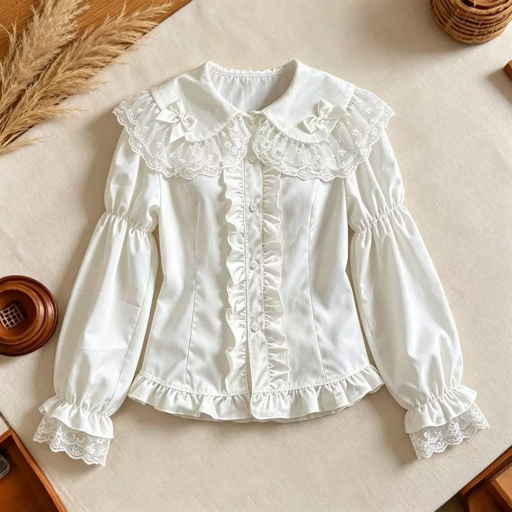 Ivory-white long-sleeve Lolita blouse with lace collar, bows and gathered cuffs