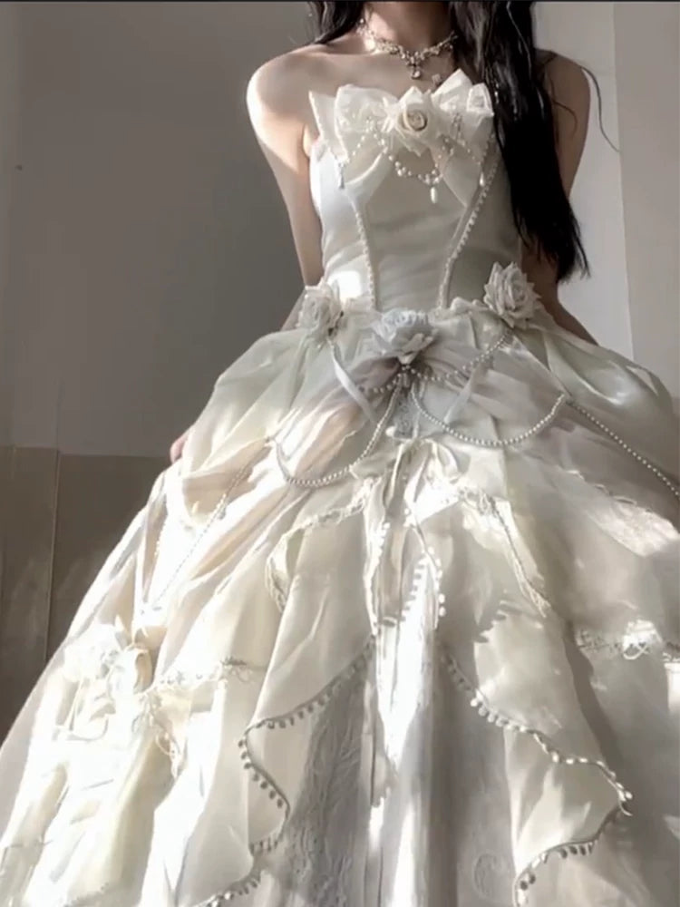 Model wearing champagne Flora Muse Rose Encounter lolita gown, full-length view