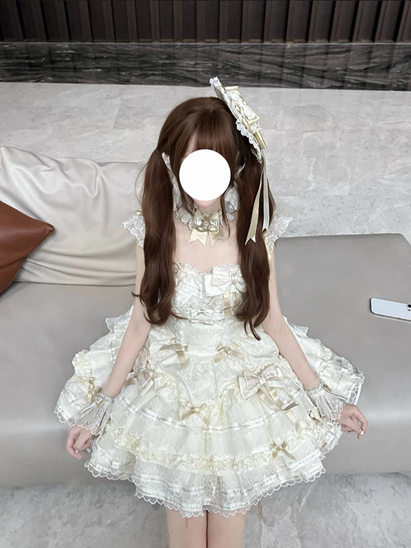 Creamy apricot ballet-inspired dress set with layered ruffles and a large train.