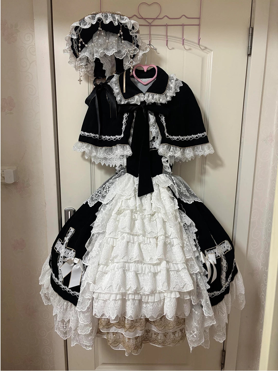 Black-and-white JSK set with lace cape, hat and layered white apron