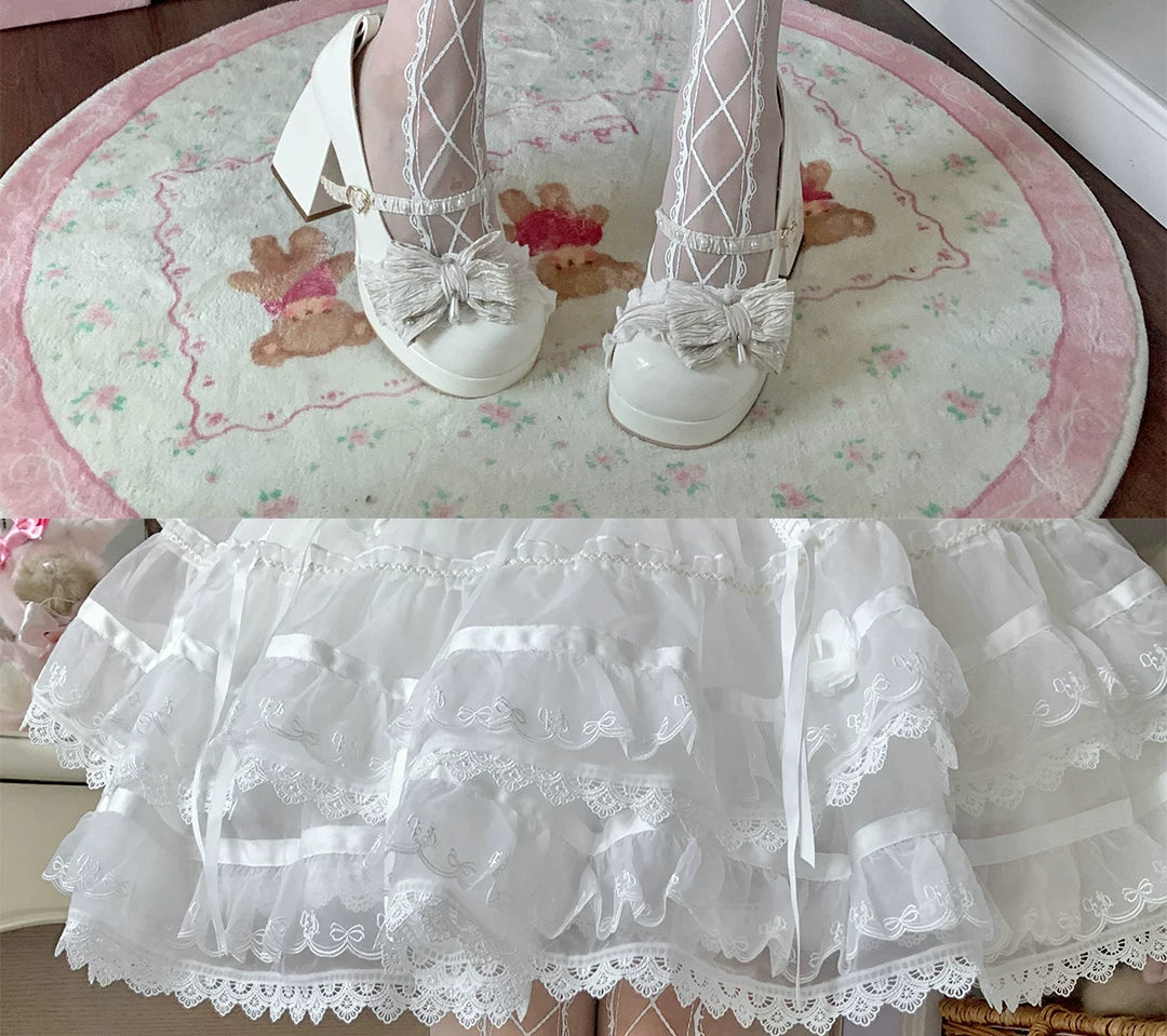 roji roji white crisscross lattice tights with lace trim styled beneath a skirt