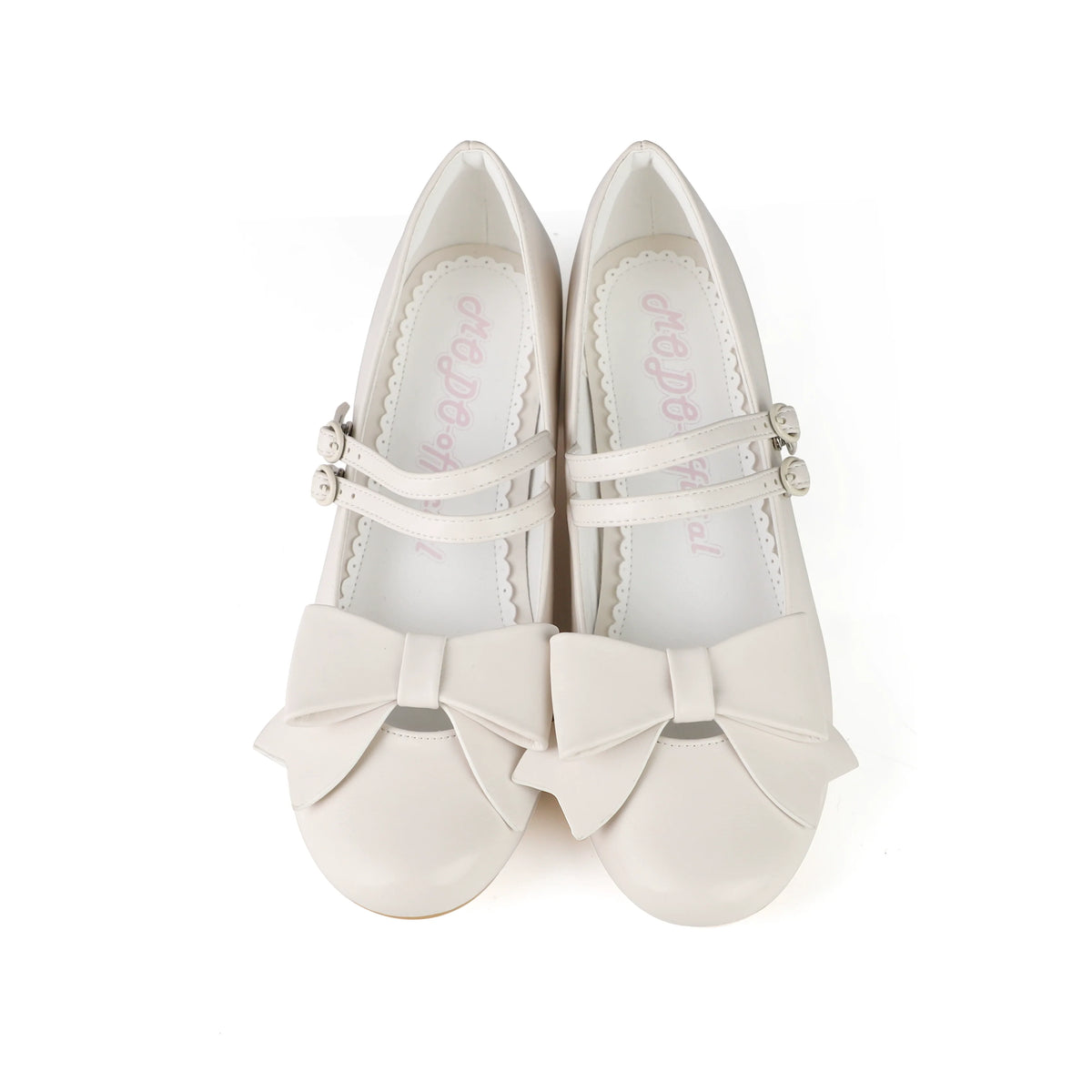 Red pointed-toe Lolita shoes with double straps and oversized bows.