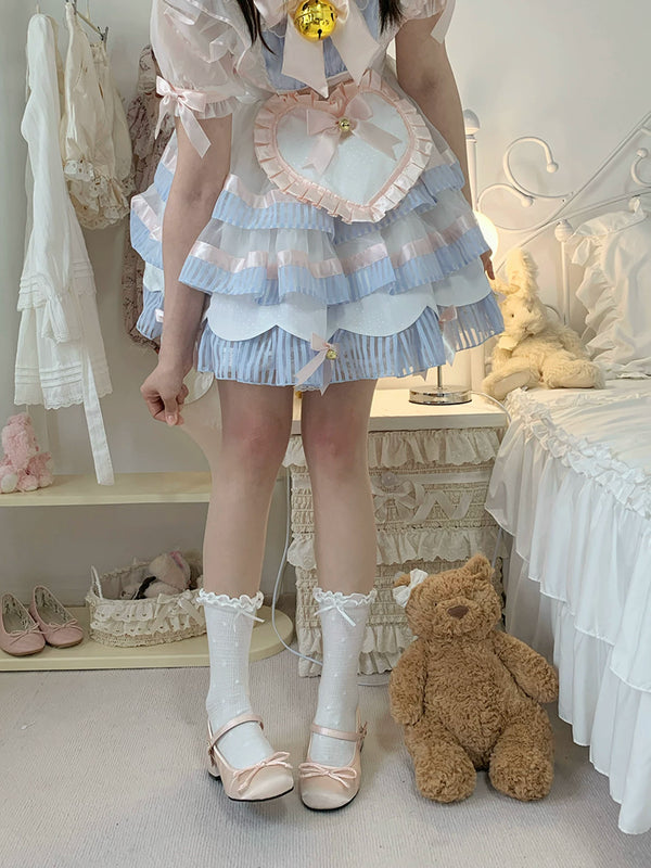 White pantyhose with soft pink knee blush accents worn with a blue ruffled coordinate