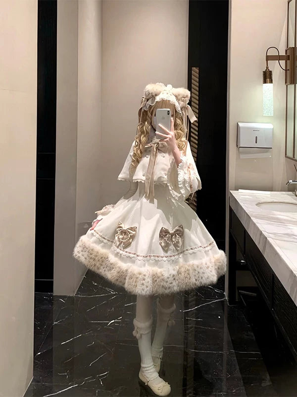 White cape dress set with a cape, dress and base-layer top shown in a mirror.