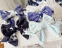White & Blue Bow Pin
