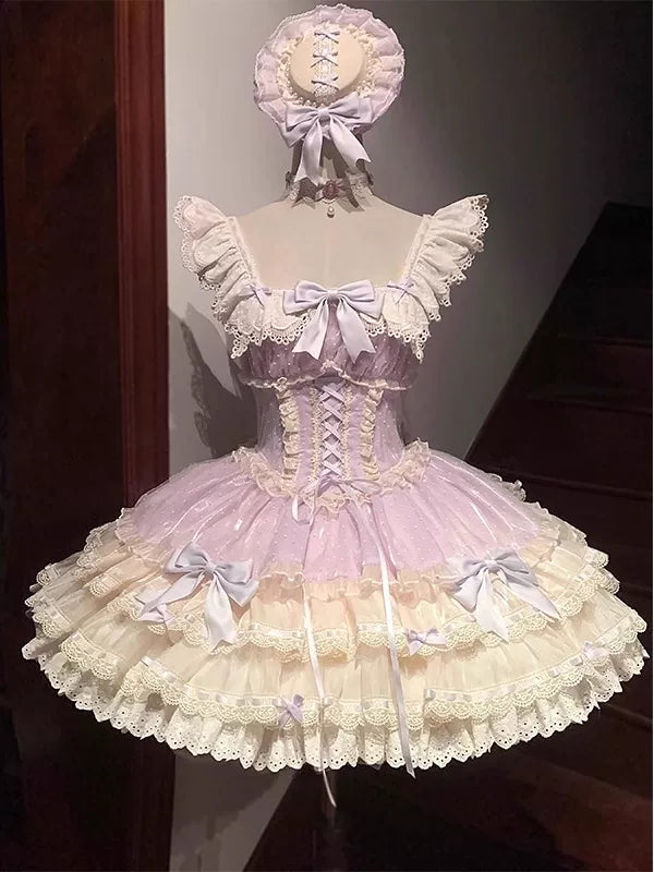 Purple tiered JSK dress with cream lace, ruffled straps, bows, matching hat and collar on a mannequin.