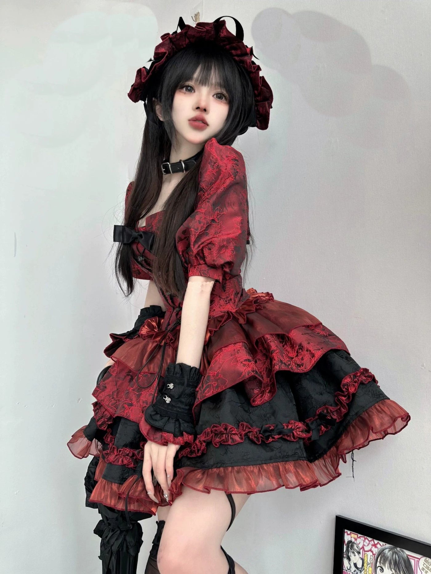Red Lolita three-piece skirt set with a fishbone bodice, shown on a model.