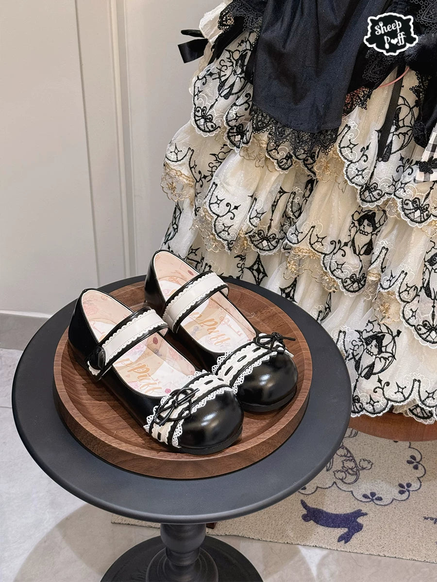 Sheep Puff Classic Heart Bow Lolita Shoes with low heels, featuring a cute heart bow design and soft pastel color.