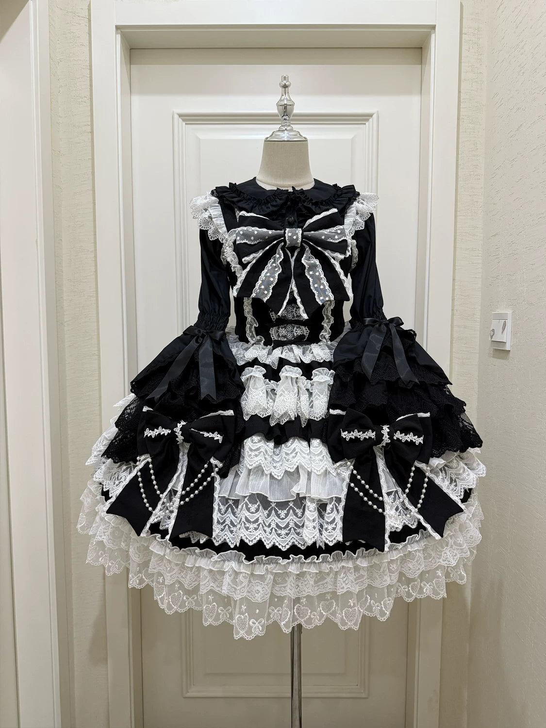 Lady Han Cross Heart Knot Sweet JSK dress by Lolita Fetch featuring a charming heart knot design and elegant silhouette.