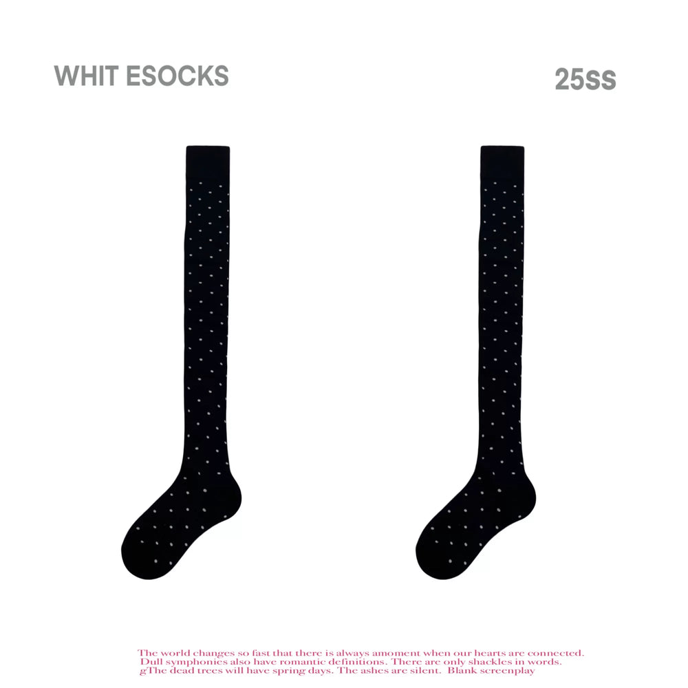 Black polka-dot over-the-knee socks shown as a complete pair on a white background.