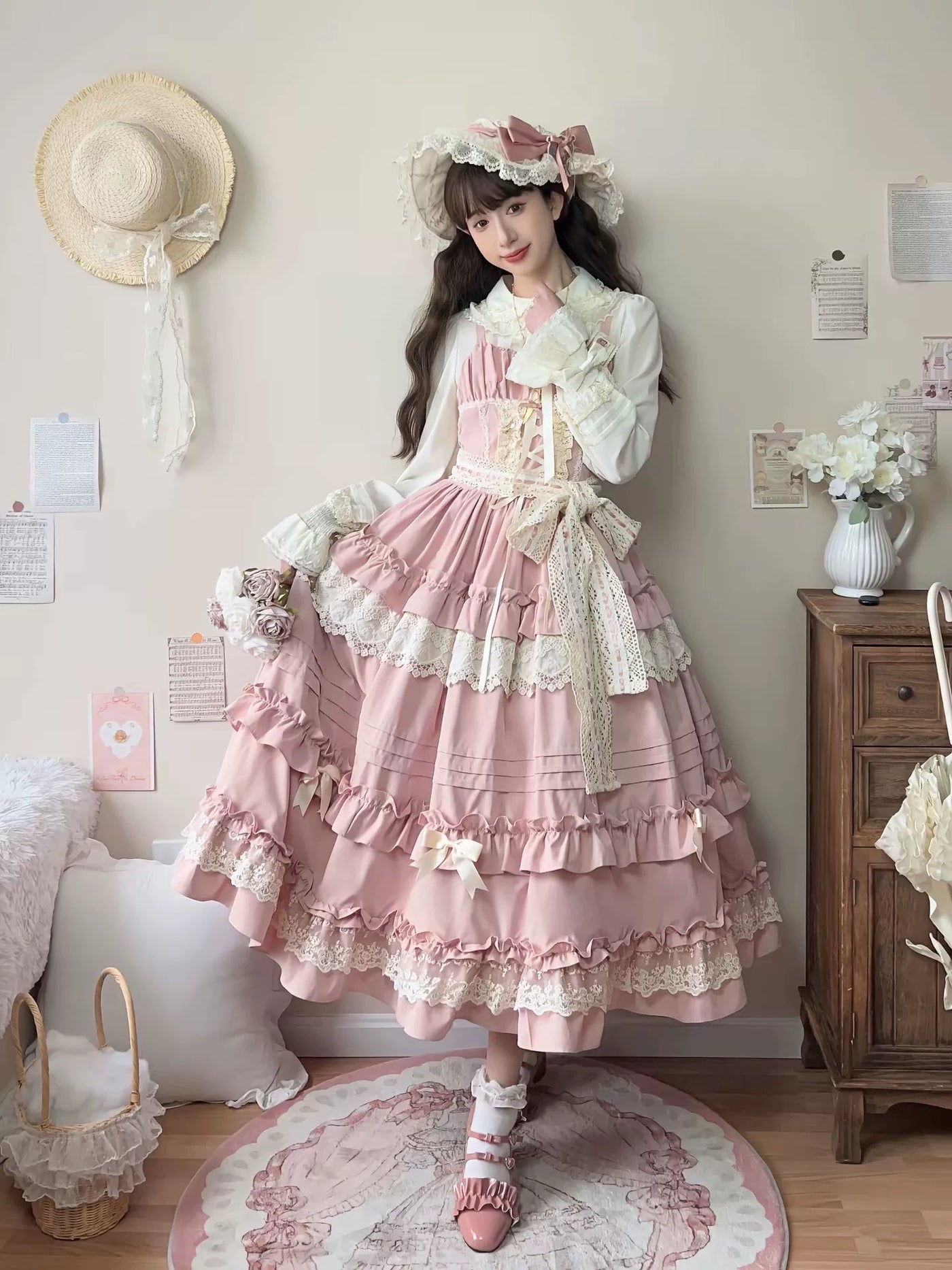 Classical Lolita JSK in sakura pink with cream lace trim and tiered skirt