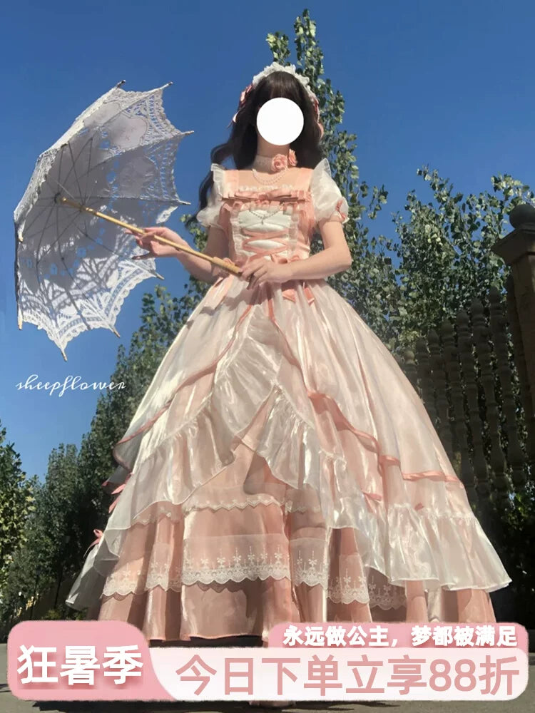 Blush pink sweet lolita ballgown dress with corset front lacing and tiered skirt, front view