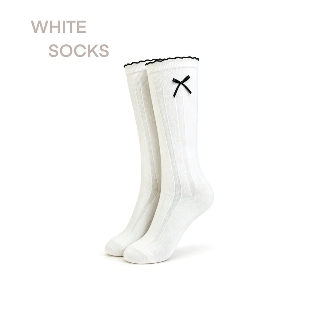 White mid-calf socks showing bow and three-stripe cuff variations in styling photos.