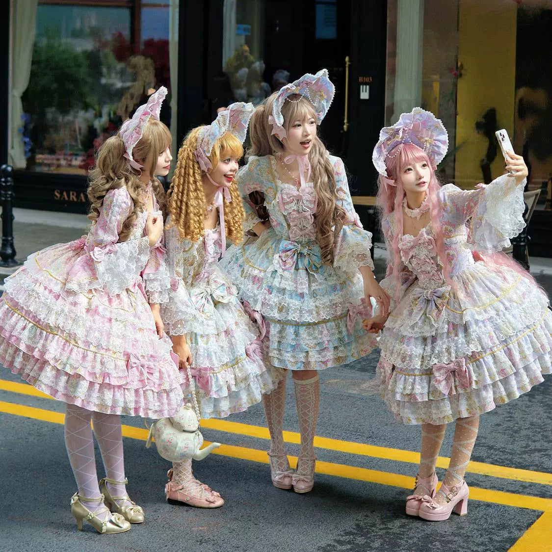 Lady Han Sweet OP dress by Lolita Fetch featuring a detailed candelabra chapter design, with lace and bow accents in a pastel color.